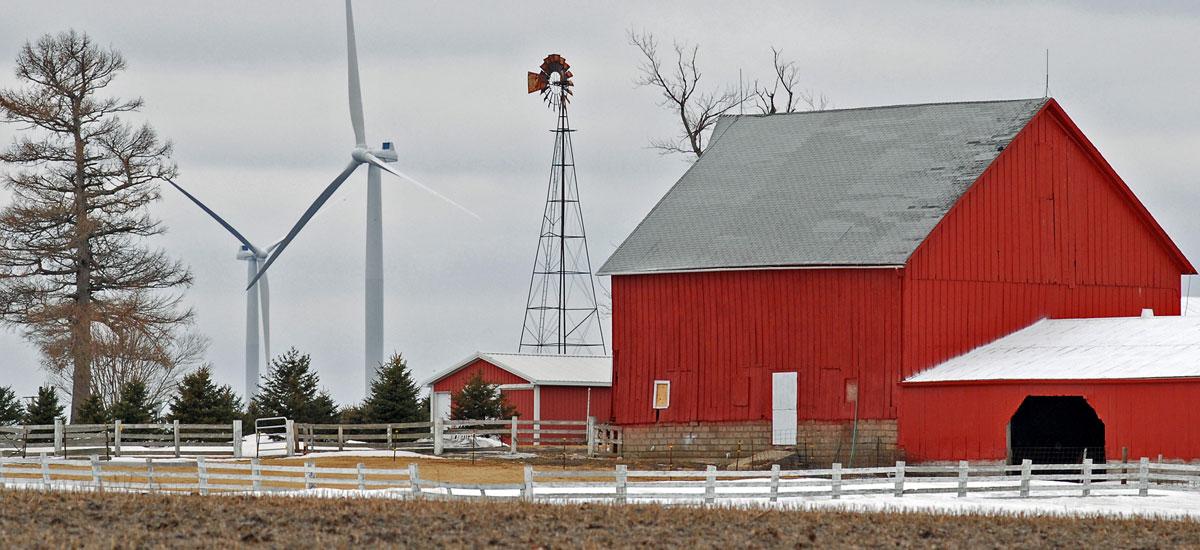 wind turbines and red barn in illinois