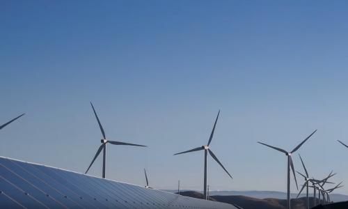 Wind turbines with solar panels