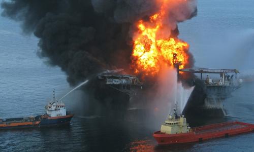 Two boats help to put out a fire caused by the Deepwater Horizon oil spill.