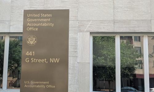 A sign in front of a building that reads "United States Government Accountability Office."