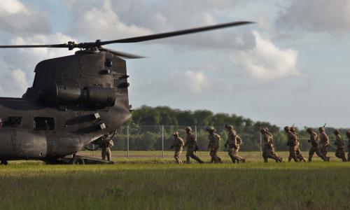 troops boarding a helicopter