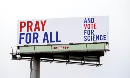 pray for all and vote for science billboard